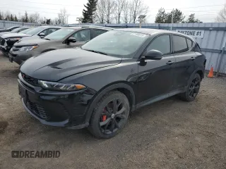 2023 Dodge Hornet GT Plus with VIN ZACNDFBN7P3A04306, listed as a Copart auction lot 51105815 with 50,682 mi miles and Clean Title. Bid and sale history available at DreamBid. Image 1.
