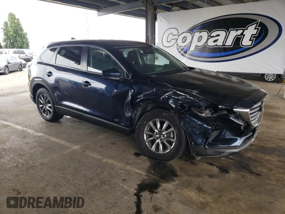 2018 Mazda CX-9 Sport with VIN JM3TCABY2J0220049, listed as a Copart auction lot 60175175 with 56,140 mi miles and Salvage title. Bid and sale history available at DreamBid. Image 4.