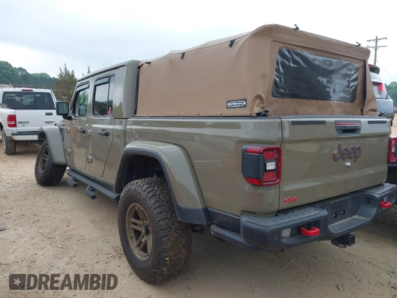 2020 Jeep Gladiator Rubicon z VIN 1C6JJTBG6LL179541, wystawiony jako IAAI lot #42050510 z przebiegiem 52 784 mil mil oraz . Historia ofert i sprzedaży dostępna na DreamBid. Obrazek 3.