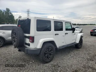 2018 Jeep Wrangler Unlimited Sahara with VIN 1C4BJWEG2JL851277, listed as a Copart auction lot 63631645 with 83,851 mi miles and Salvage title. Bid and sale history available at DreamBid. Image 3.