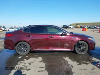 2017 Kia Optima SX Limited with VIN 5XXGV4L23HG157052, listed as a IAAI auction lot 41450492 with 85,949 mi miles and . Bid and sale history available at DreamBid. Image 13.