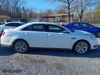 2013 Ford Taurus Limited with VIN 1FAHP2F82DG131585, listed as a IAAI auction lot 41076163 with 134,916 mi miles. Bid and sale history available at carsss.com. Image 14.
