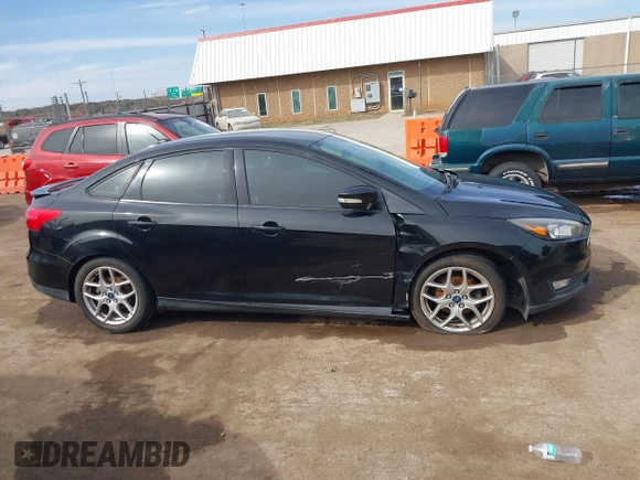2015 Ford Focus SE with VIN 1FADP3F26FL356554, listed as a IAAI auction lot 41773139 with 143,911 mi miles. Bid and sale history available at carsss.com. Image 13.
