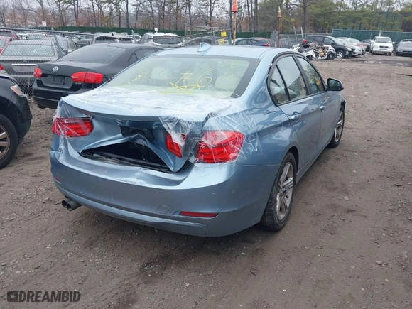 2013 BMW 3 Series 328i xDrive with VIN WBA3B3C53DF531564, listed as a IAAI auction lot 41927678 with 999,999 mi miles. Bid and sale history available at carsss.com. Image 4.