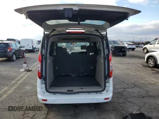 2016 Ford Transit Connect XLT with VIN NM0AE8F7XG1234396, listed as a Copart auction lot 83246404 with 82,787 mi miles and Salvage title. Bid and sale history available at DreamBid. Image 6.