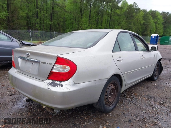 2003 Toyota Camry LE with VIN 4T1BE32K63U755835, listed as a IAAI auction lot 41976402 with 215,788 mi miles and . Bid and sale history available at DreamBid. Image 4.