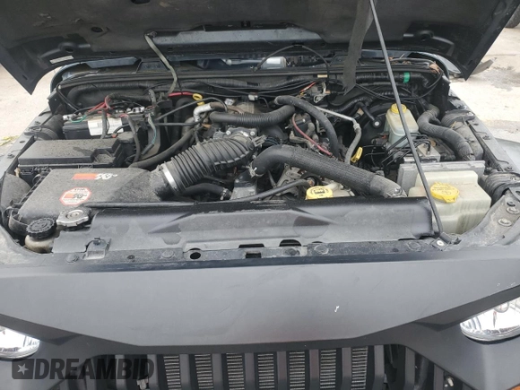 2007 Jeep Wrangler Unlimited Sahara with VIN 1J4GB59177L226122, listed as a Copart auction lot 55529575 with 208,811 mi miles and Salvage title. Bid and sale history available at DreamBid. Image 11.