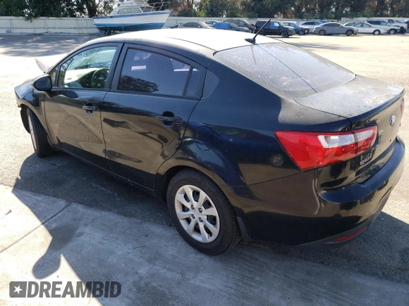 2014 Kia Rio LX with VIN KNADM4A35E6407058, listed as a Copart auction lot 72997044 with 76,215 mi miles and Salvage Title. Bid and sale history available at DreamBid. Image 2.