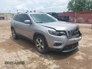 2019 Jeep Cherokee Limited z VIN 1C4PJMDX9KD464104, wystawiony jako IAAI lot #42420955 z przebiegiem 129 858 mil mil oraz . Historia ofert i sprzedaży dostępna na DreamBid. Obrazek 1.
