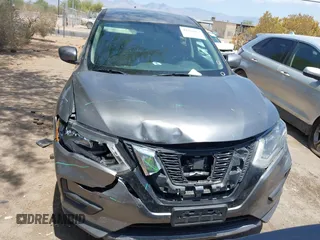 2017 Nissan Rogue S with VIN KNMAT2MT6HP610077, listed as a IAAI auction lot 42726053 with 236,304 mi miles and . Bid and sale history available at DreamBid. Image 12.