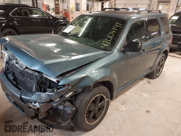2011 Ford Escape XLT with VIN 1FMCU0D70BKB25088, listed as a IAAI auction lot 42004191 with 200,665 mi miles. Bid and sale history available at carsss.com. Image 6.