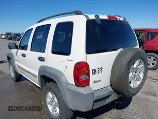 2002 Jeep Liberty Sport with VIN 1J8GL48KX2W153948, listed as a IAAI auction lot 41843882 with 180,677 mi miles. Bid and sale history available at carsss.com. Image 3.