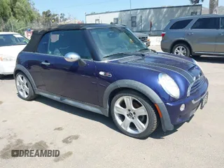 2005 MINI Convertible S with VIN WMWRH33435TF81760, listed as a IAAI auction lot 41993851 with 121,430 mi miles and . Bid and sale history available at DreamBid. Image 1.