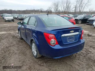 2014 Chevrolet Sonic LT with VIN 1G1JC5SG7E4117814, listed as a IAAI auction lot 41711814 with 97,723 mi miles. Bid and sale history available at carsss.com. Image 3.