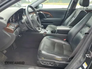 2006 Acura RL z VIN JH4KB16596C004369, wystawiony jako Copart lot #54237425 z przebiegiem 191 708 mil mil oraz Szkody całkowita. Historia ofert i sprzedaży dostępna na DreamBid. Obrazek 7.
