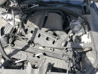 2015 BMW 7 Series 740Li with VIN WBAYE4C52FD947168, listed as a Copart auction lot 71287564 with 103,444 mi miles and Salvage Title. Bid and sale history available at DreamBid. Image 11.