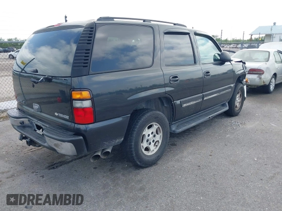 2005 Chevrolet Tahoe LS with VIN 1GNEC13V35R263104, listed as a IAAI auction lot 41918482 with 208,520 mi miles and . Bid and sale history available at DreamBid. Image 4.