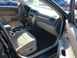2010 Ford Fusion Hybrid z VIN 3FADP0L39AR396746, wystawiony jako IAAI lot #41764282 z przebiegiem 132 582 mil mil oraz . Historia ofert i sprzedaży dostępna na DreamBid. Obrazek 5.