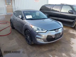 2013 Hyundai Veloster w/Black Int with VIN KMHTC6AD2DU158889, listed as a IAAI auction lot 41878065 with 157,450 mi miles and . Bid and sale history available at DreamBid. Image 1.