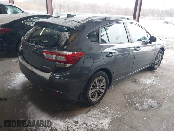2018 Subaru Impreza Premium z VIN 4S3GTAB6XJ3727210, wystawiony jako IAAI lot #41336223 z przebiegiem 75 305 mil mil oraz . Historia ofert i sprzedaży dostępna na DreamBid. Obrazek 4.