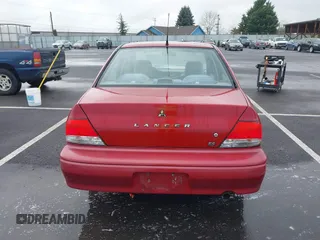 2003 Mitsubishi Lancer ES with VIN JA3AJ26E13U107196, listed as a IAAI auction lot 41745889 with 182,515 mi miles. Bid and sale history available at carsss.com. Image 16.
