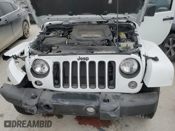 2015 Jeep Wrangler Altitude z VIN 1C4GJWBG8FL730965, wystawiony jako Copart lot #86276064 z przebiegiem 43 541 mil mil oraz Szkoda całkowita • Salvage title. Historia ofert i sprzedaży dostępna na DreamBid. Obrazek 13.