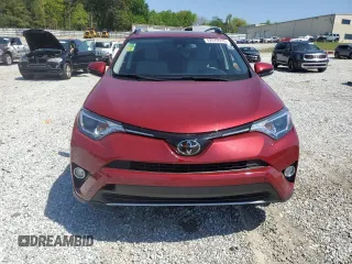 2018 Toyota RAV4 XLE with VIN JTMWFREV7JD119143, listed as a Copart auction lot 52576915 with 56,947 mi miles and Salvage Title. Bid and sale history available at carsss.com. Image 5.