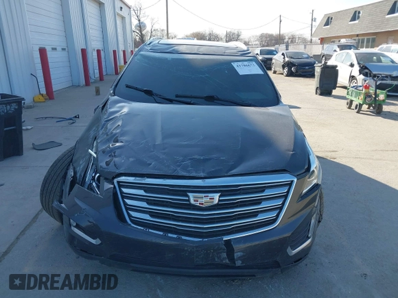 2017 Cadillac XT5 Luxury FWD with VIN 1GYKNBRS0HZ105603, listed as a IAAI auction lot 41786673 with 75,482 mi miles. Bid and sale history available at carsss.com. Image 12.