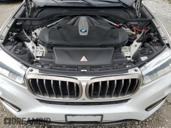 2015 BMW X6 xDrive50i with VIN 5UXKU6C51F0F94180, listed as a Copart auction lot 55306944 with 98,590 mi miles and Salvage Title. Bid and sale history available at carsss.com. Image 12.