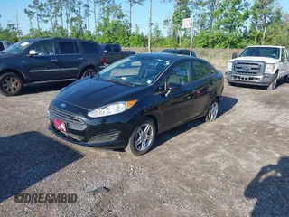 2019 Ford Fiesta SE z VIN 3FADP4BJ2KM159022, wystawiony jako IAAI lot #42269813 z przebiegiem 55 107 mil mil oraz . Historia ofert i sprzedaży dostępna na DreamBid. Obrazek 2.
