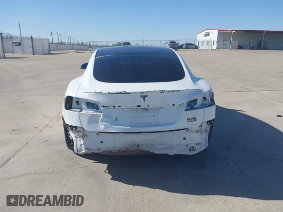 2022 Tesla Model S Plaid with VIN 5YJSA1E69NF486471, listed as a IAAI auction lot 41228818 with 49,207 mi miles and . Bid and sale history available at carsss.com. Image 16.