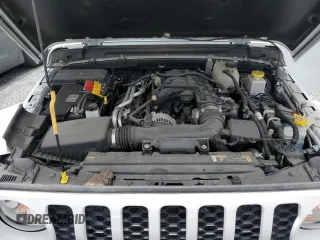 2023 Jeep Gladiator Freedom z VIN 1C6HJTAG6PL535119, wystawiony jako Copart lot #56870905 z przebiegiem 23 707 mil mil oraz Szkoda całkowita • Salvage title. Historia ofert i sprzedaży dostępna na DreamBid. Obrazek 11.