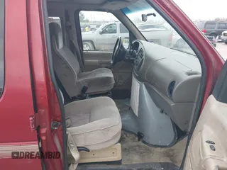 1999 Ford Econoline Cargo with VIN 1FDRE14W0XHB06565, listed as a IAAI auction lot 41496511 with 165,268 mi miles. Bid and sale history available at carsss.com. Image 5.