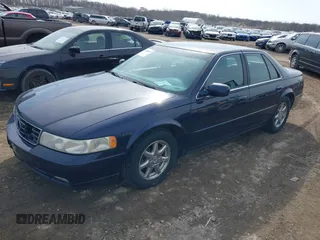1999 Cadillac Seville Touring STS z VIN 1G6KY5493XU913994, wystawiony jako IAAI lot #41780695 z przebiegiem 60 375 mil mil oraz . Historia ofert i sprzedaży dostępna na DreamBid. Obrazek 2.