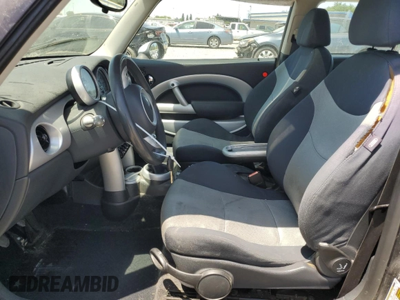 2006 MINI Hardtop with VIN WMWRC33516TK73752, listed as a Copart auction lot 62053245 with 126,836 mi miles and Clean title. Bid and sale history available at DreamBid. Image 7.