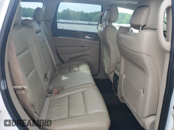 2022 Jeep Grand Cherokee Limited with VIN 1C4RJEBG8NC125927, listed as a Copart auction lot 57166605 with 74,013 mi miles and Salvage title. Bid and sale history available at DreamBid. Image 11.