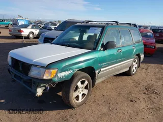 1998 Subaru Forester S with VIN JF1SF6554WH759085, listed as a IAAI auction lot 41794273 with 152,949 mi miles. Bid and sale history available at carsss.com. Image 2.
