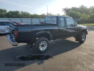 1993 Toyota Pickup z VIN JT4RN13P7P6049713, wystawiony jako Copart lot #58196075 z przebiegiem 151 289 mil mil oraz Tytuł czysty. Historia ofert i sprzedaży dostępna na DreamBid. Obrazek 3.