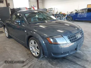 2003 Audi TT with VIN TRUSC28NX31013693, listed as a IAAI auction lot 42662736 with 109,743 mi miles and . Bid and sale history available at DreamBid. Image 1.