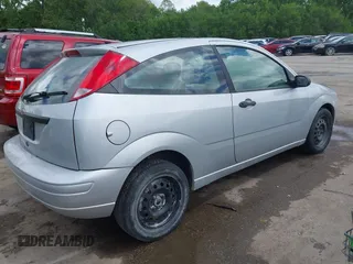 2007 Ford Focus S with VIN 1FAFP31N97W218727, listed as a IAAI auction lot 42183392 with 135,456 mi miles and . Bid and sale history available at carsss.com. Image 4.