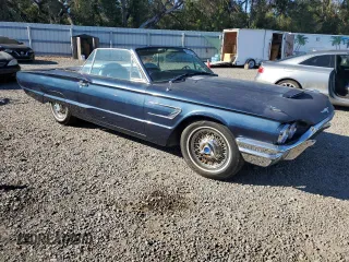 1965 Ford Thunderbird with VIN 5Y85Z115781, listed as a Copart auction lot 82289124 with 75,677 mi miles and Salvage Title. Bid and sale history available at DreamBid. Image 4.