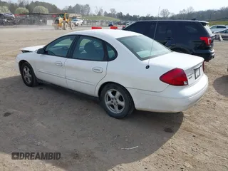 2003 Ford Taurus SE Standard with VIN 1FAFP53U73A107231, listed as a IAAI auction lot 41826418 with 123,774 mi miles. Bid and sale history available at carsss.com. Image 3.