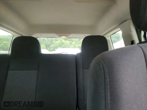 2014 Jeep Patriot Latitude with VIN 1C4NJRFB0ED649779, listed as a Copart auction lot 60444435 with 161,009 mi miles and Salvage title. Bid and sale history available at DreamBid. Image 10.