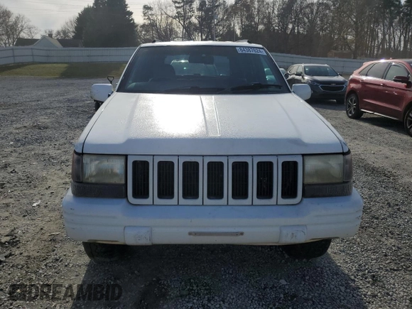 1996 Jeep Grand Cherokee Limited с VIN 1J4GZ78S2TY123592, выставлен на аукционе Copart как лот 84387624 с пробегом Не указан миль и Списание • Salvage title. История ставок и продаж доступна на DreamBid. Изображение 5.