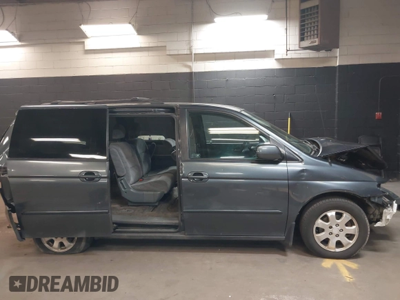 2004 Honda Odyssey EX-RES z VIN 5FNRL18814B092516, wystawiony jako IAAI lot #42108211 z przebiegiem 214 312 mil mil oraz . Historia ofert i sprzedaży dostępna na DreamBid. Obrazek 14.