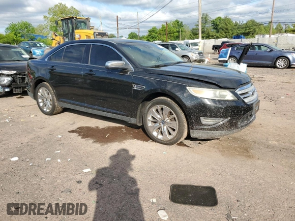2012 Ford Taurus Limited z VIN 1FAHP2FW6CG136463, wystawiony jako Copart lot #57159005 z przebiegiem 124 833 mil mil oraz Szkoda całkowita • Salvage title. Historia ofert i sprzedaży dostępna na DreamBid. Obrazek 4.