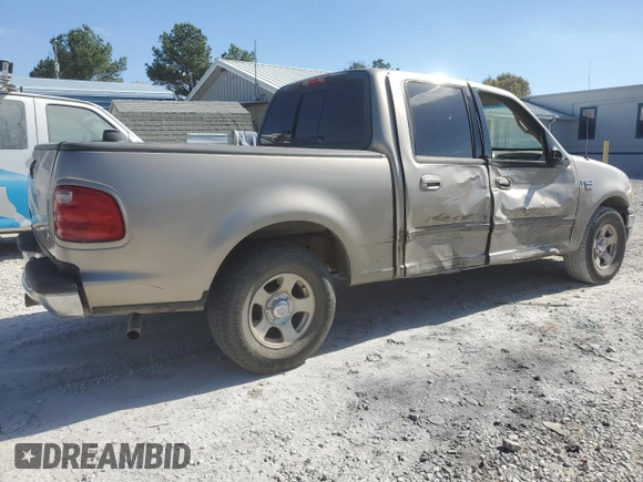 2002 Ford F-150 XLT with VIN 1FTRW07L22KB89313, listed as a Copart auction lot 76680834 with 377,443 mi miles and Salvage Title. Bid and sale history available at DreamBid. Image 3.
