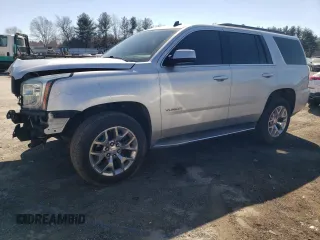 2015 GMC Yukon SLE with VIN 1GKS2AKC2FR200015, listed as a Copart auction lot 45371345 with 66,525 mi miles and Salvage Title. Bid and sale history available at carsss.com. Image 1.