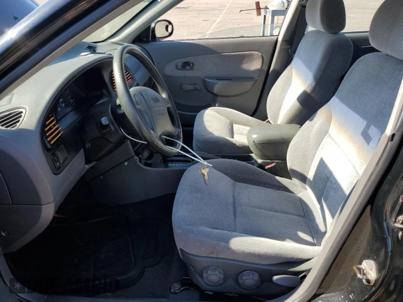 2001 Kia Spectra GS z VIN KNAFB161115036033, wystawiony jako Copart lot #55939335 z przebiegiem 76 414 mil mil oraz Szkoda całkowita • Salvage title. Historia ofert i sprzedaży dostępna na DreamBid. Obrazek 7.
