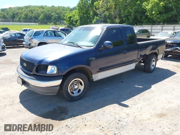 2002 Ford F-150 XL with VIN 1FTRX17282NA39327, listed as a IAAI auction lot 42343066 with Not provided miles and . Bid and sale history available at DreamBid. Image 2.
